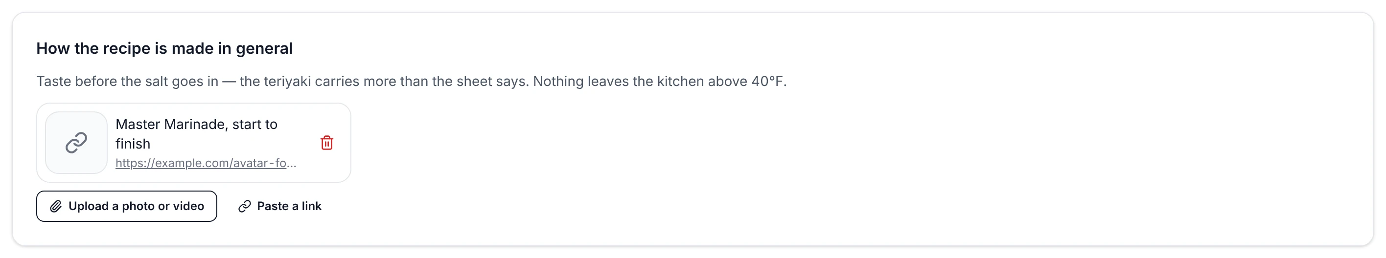 The foot of Master Marinade's steps: How the recipe is made in general holding a note about tasting before the salt, and under it a link attachment named Master Marinade, start to finish with its address, beside buttons to upload a photo or video and to paste a link.